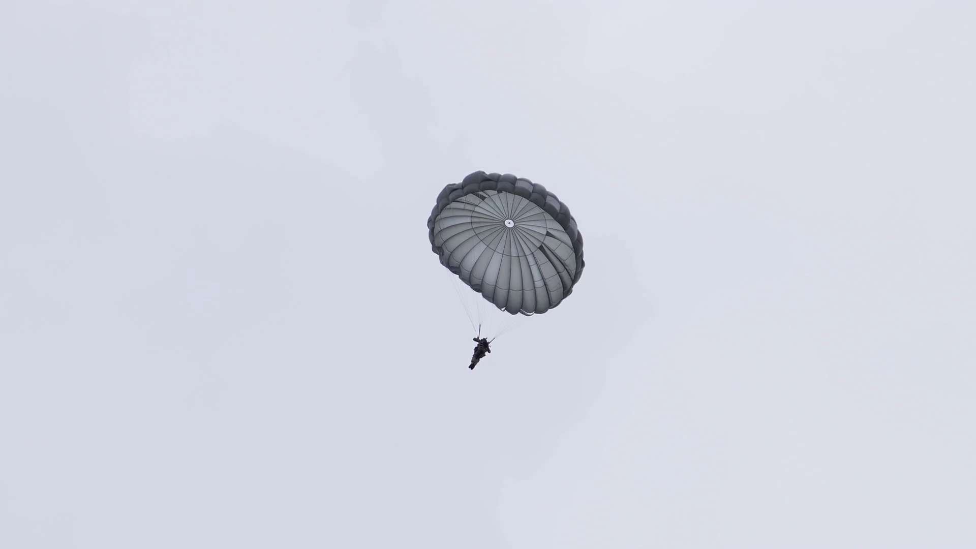 Paratrooper Falling To Ground With Parachute Stock Footage SBV