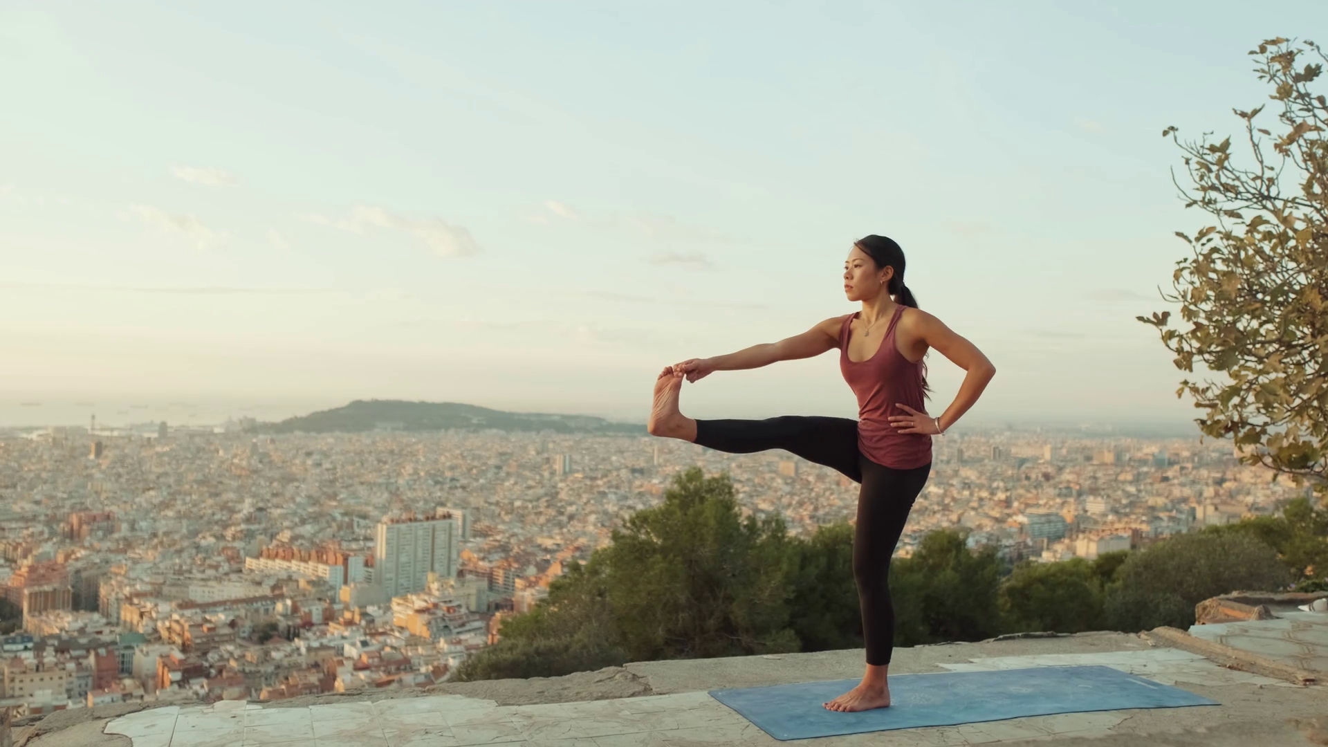 Girl Practices Yoga Stands On Leg At Lookout Stock Footage SBV347395267 Storyblocks