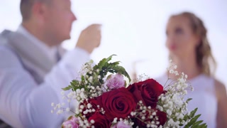 Couple with Champagne in Hands and toasting -Detail shot. Outdoors, restaurant. 4k