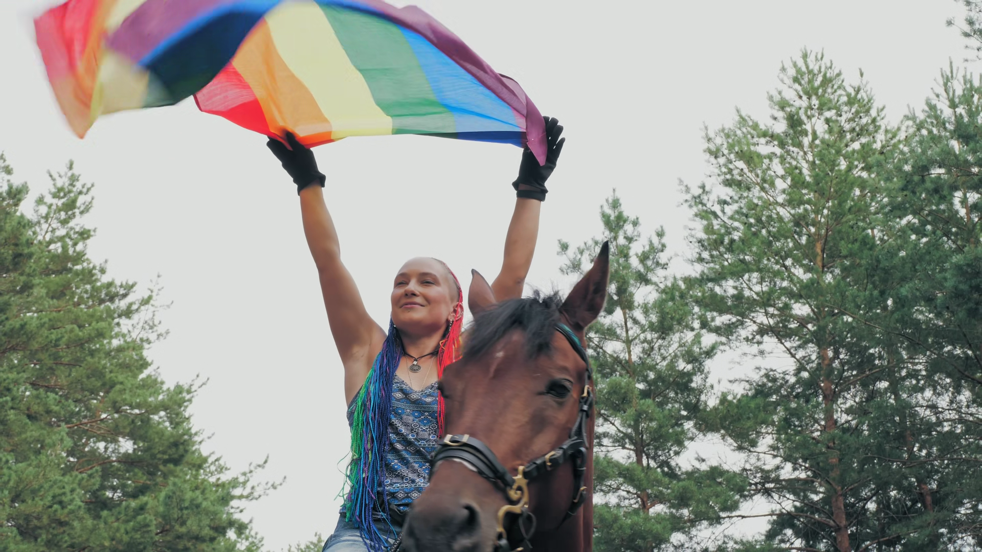 Lgbt Rider With Rainbow Dreadlocks Holding Stock Footage SBV-353565460 ...