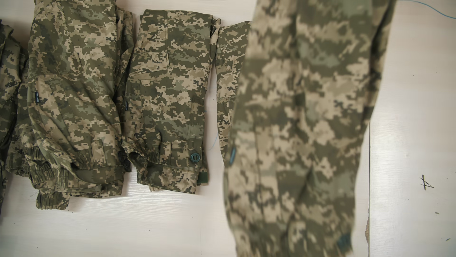 Top View Of Stacks Of Camouflage Uniforms Stock Footage SBV-353758123 ...