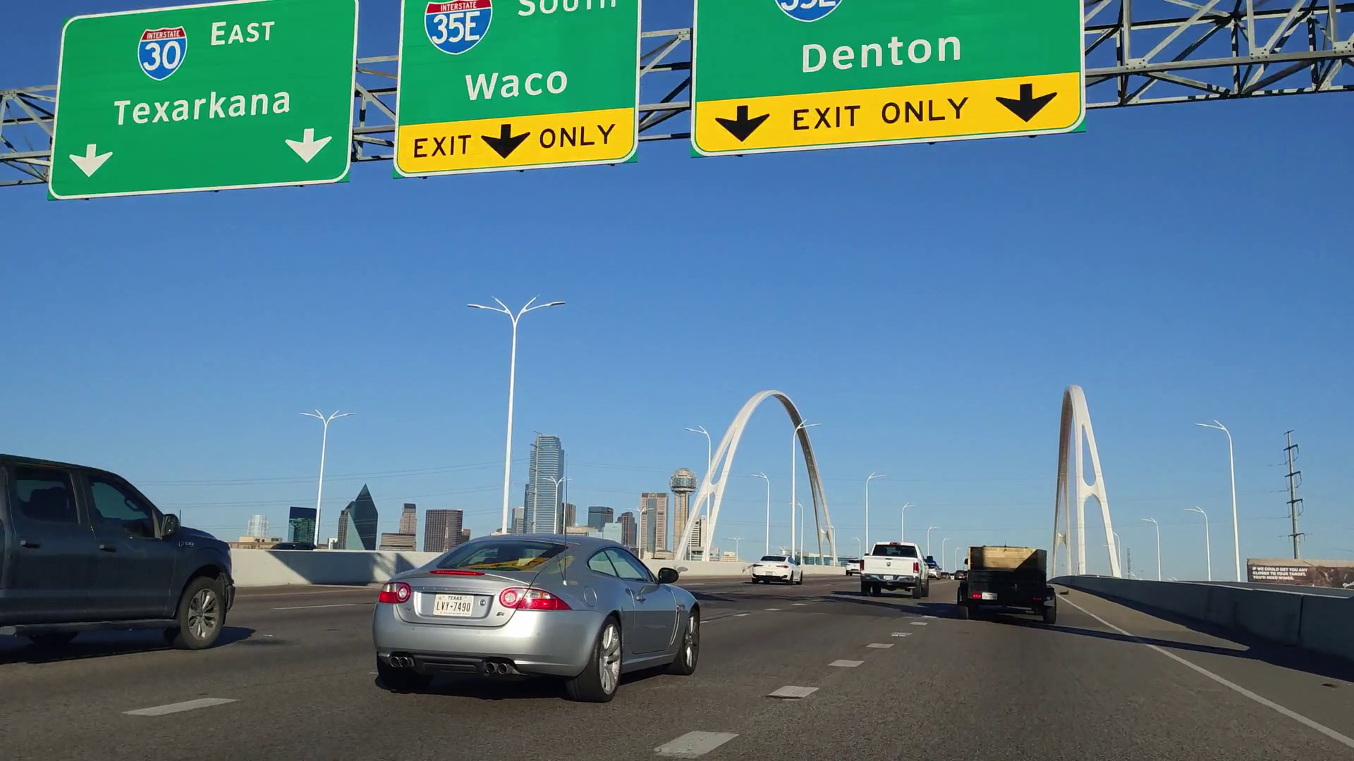 Dallas, Texas, USA Driving Car in Dallas Downtown Cityscape Skyline