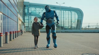 Close up child girl walking with humanoid robot cyborg talking smiling on street outdoors futuristic future machine artificial virtual