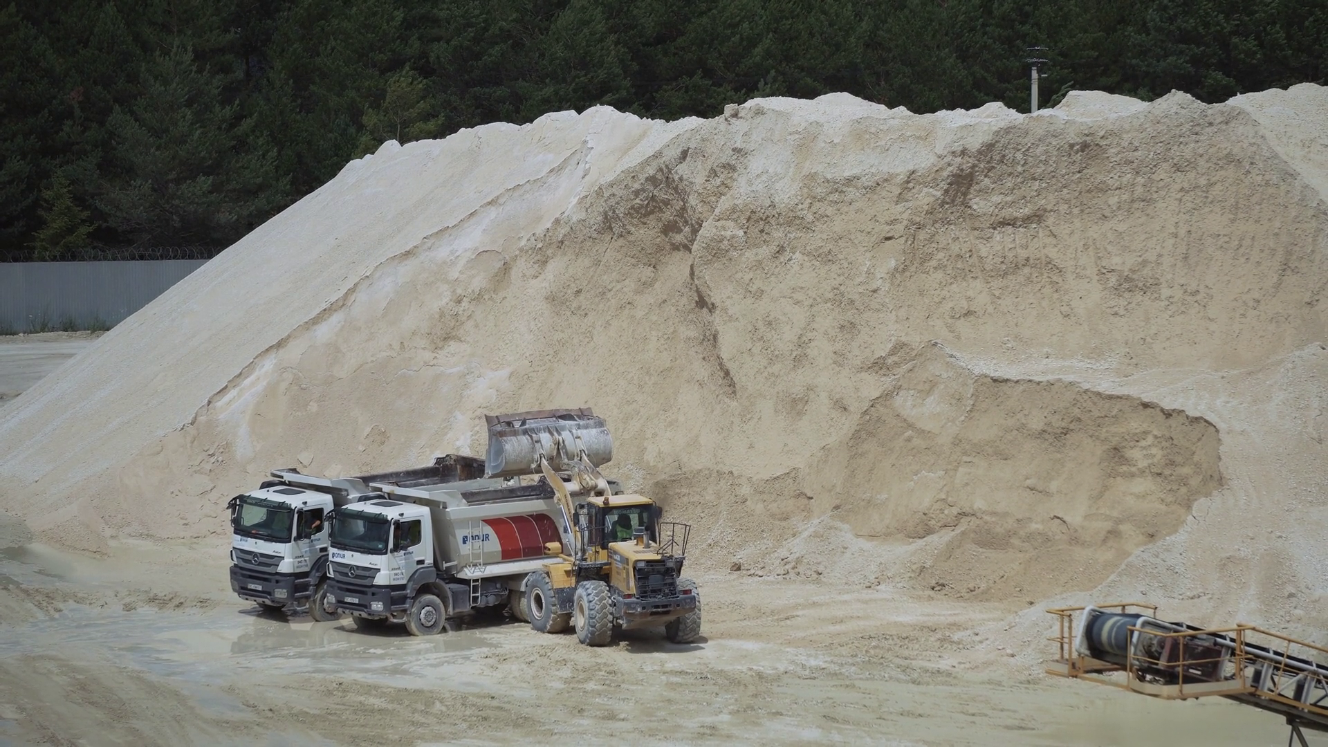 Shot Of Excavator Loading Sand Onto Trucks Stock Footage SBV-352148072 ...