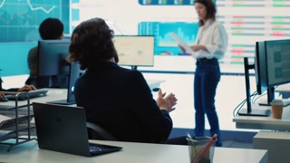 Chairman of the advisory board transmits potential company expansion plans, supervisor and the staff look into data visualizations on a big