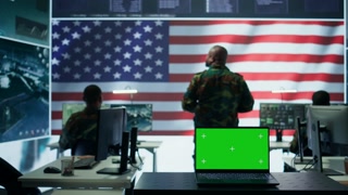 Empty chinese army power base control room using radar cctv to monitor terrorist attacks and warfare activities. Spreading fake news through