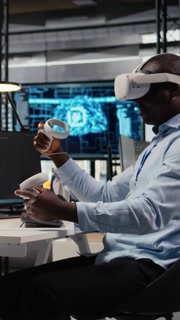 Vertical video Technician in office using VR headset equipment to accelerate complex AI calculations. IT expert using virtual reality tech
