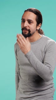 Vertical video Frisky playful man blowing kisses to camera, being flirty. Lively charming person having fun sending air kisses, doing