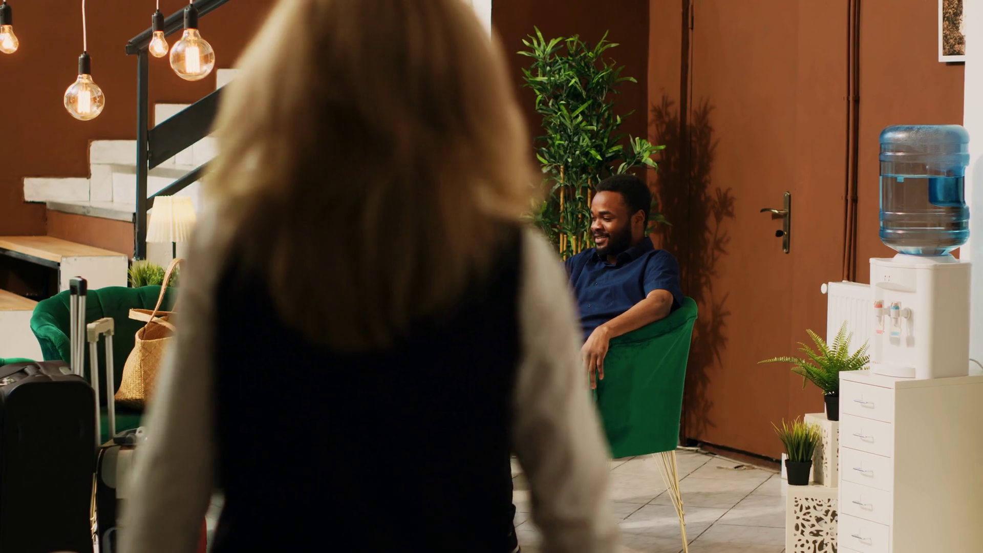 Hotel Staff Talking To Guests In Lobby Stock Footage SBV-347663195 ...