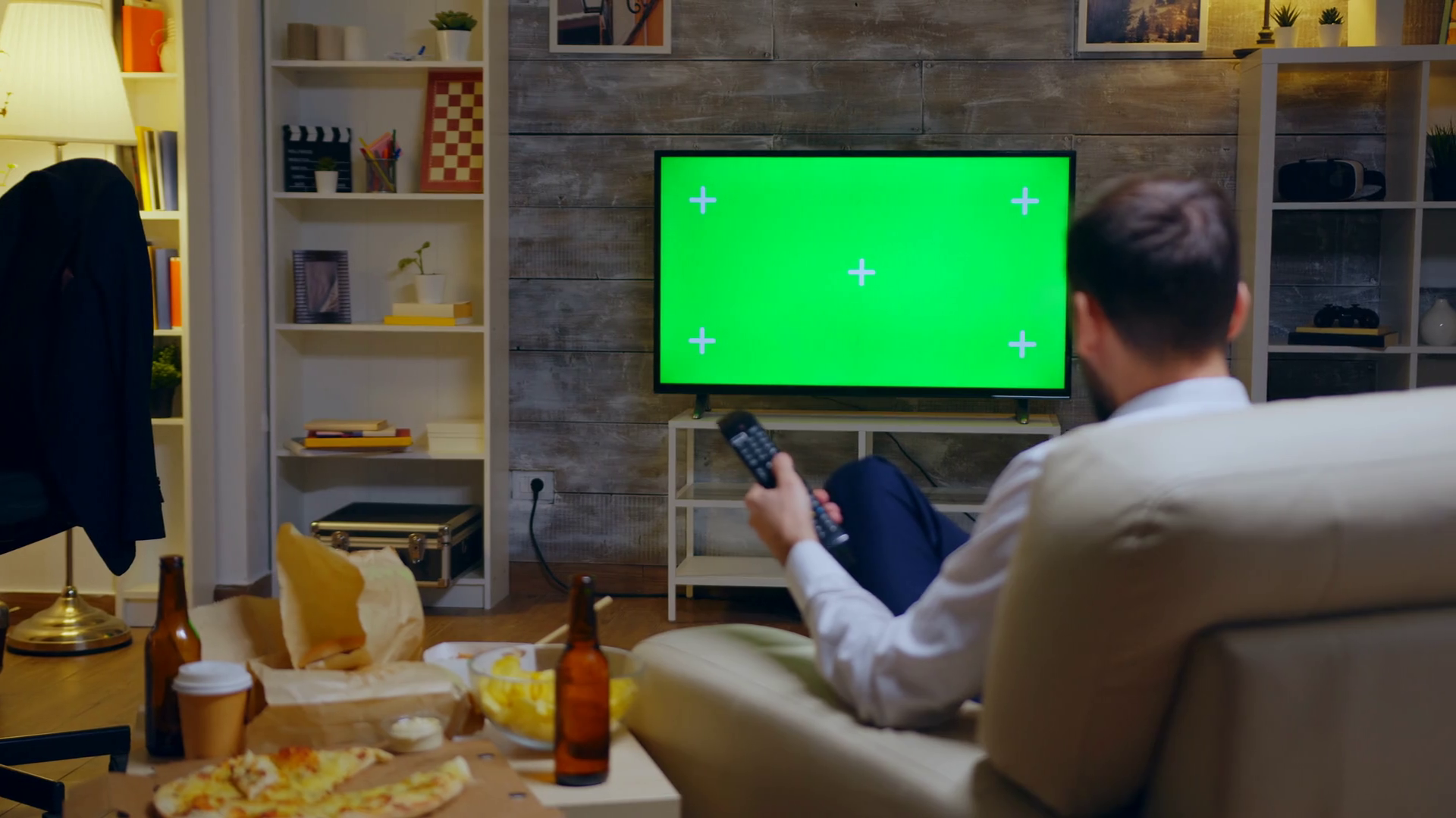 Young Man Sitting On Couch In Front Of Tv Stock Footage SBV338165138