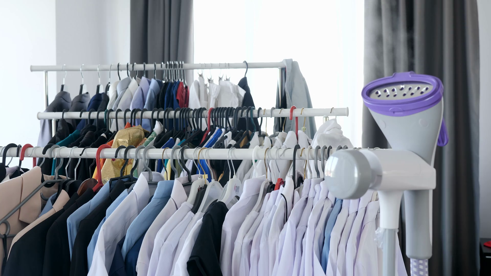 Man Steaming Clothes With Steam Iron In Stock Footage SBV322815834