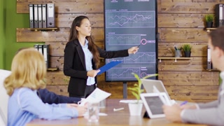 Successful presentation by a young professional in front of her management team