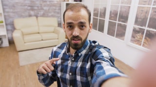 Influencer sharing thoughts in vlog. Popular content creator.