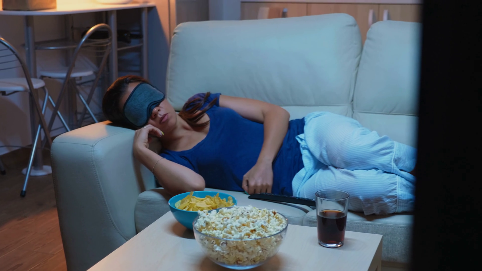 Relaxed Woman In Pajamas Resting On Sofa Stock Footage SBV338727618