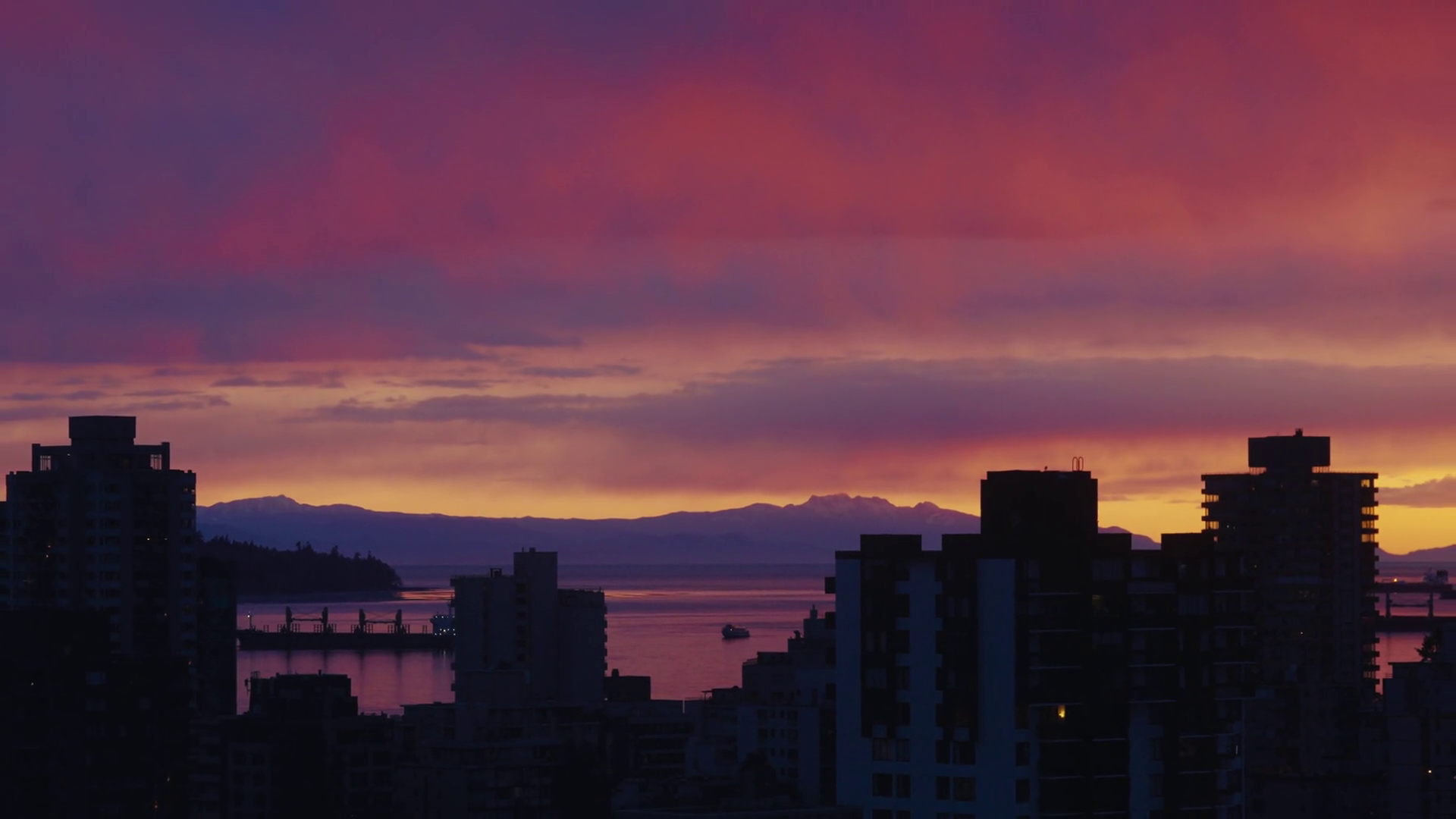 Vibrant Sunset Over City Skyline Waterfront Stock Footage SBV-351737855 ...