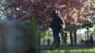 Young couple enjoying a fun and romantic date in the city park