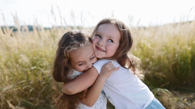 Sisters Hug Stock Footage: Royalty-Free Video Clips - Storyblocks
