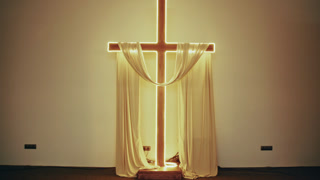 Luminous christian cross symbol of faith in church
