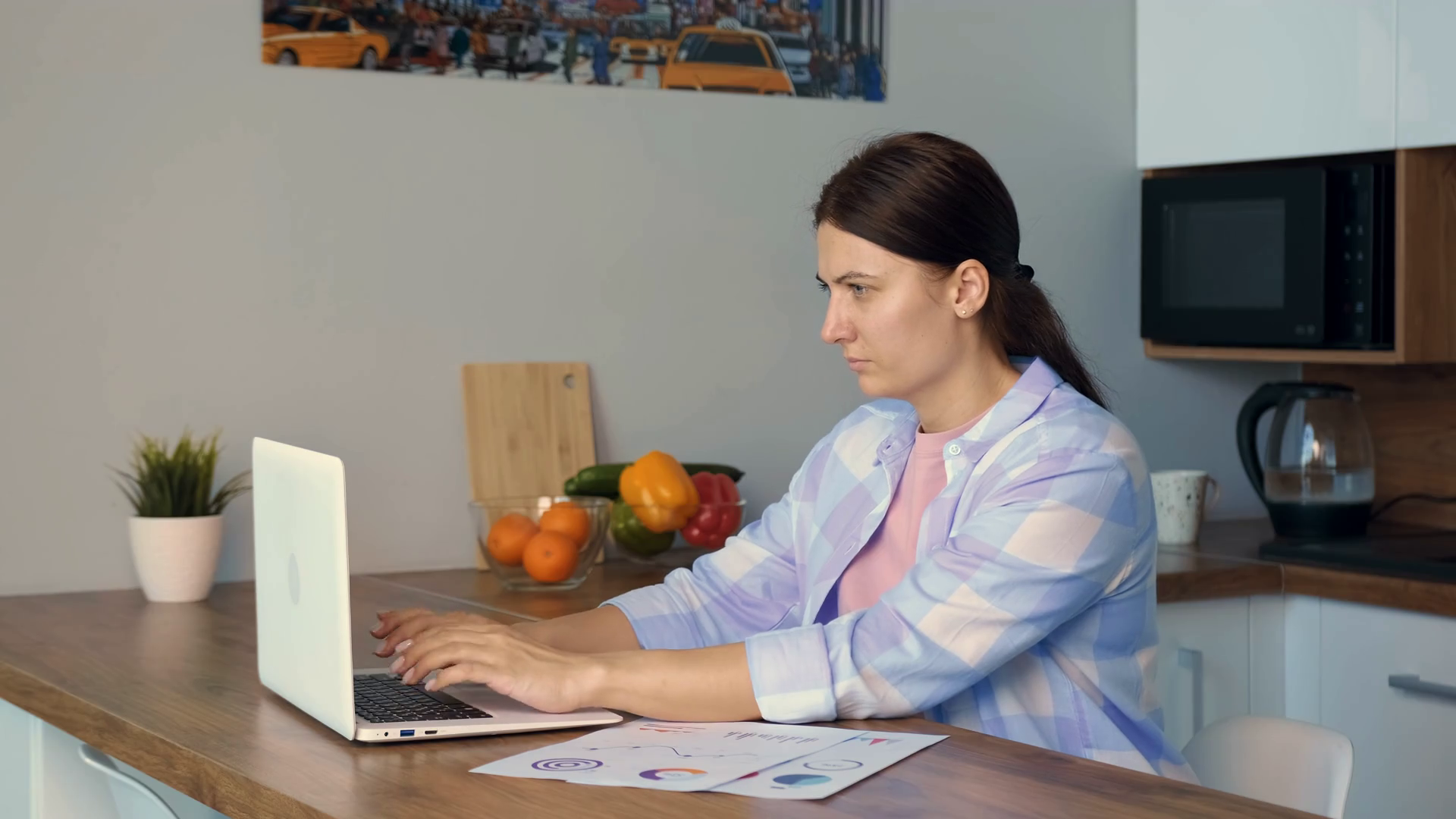 The Wife Calculates Monthly Expenses Using Stock Footage SBV347737358