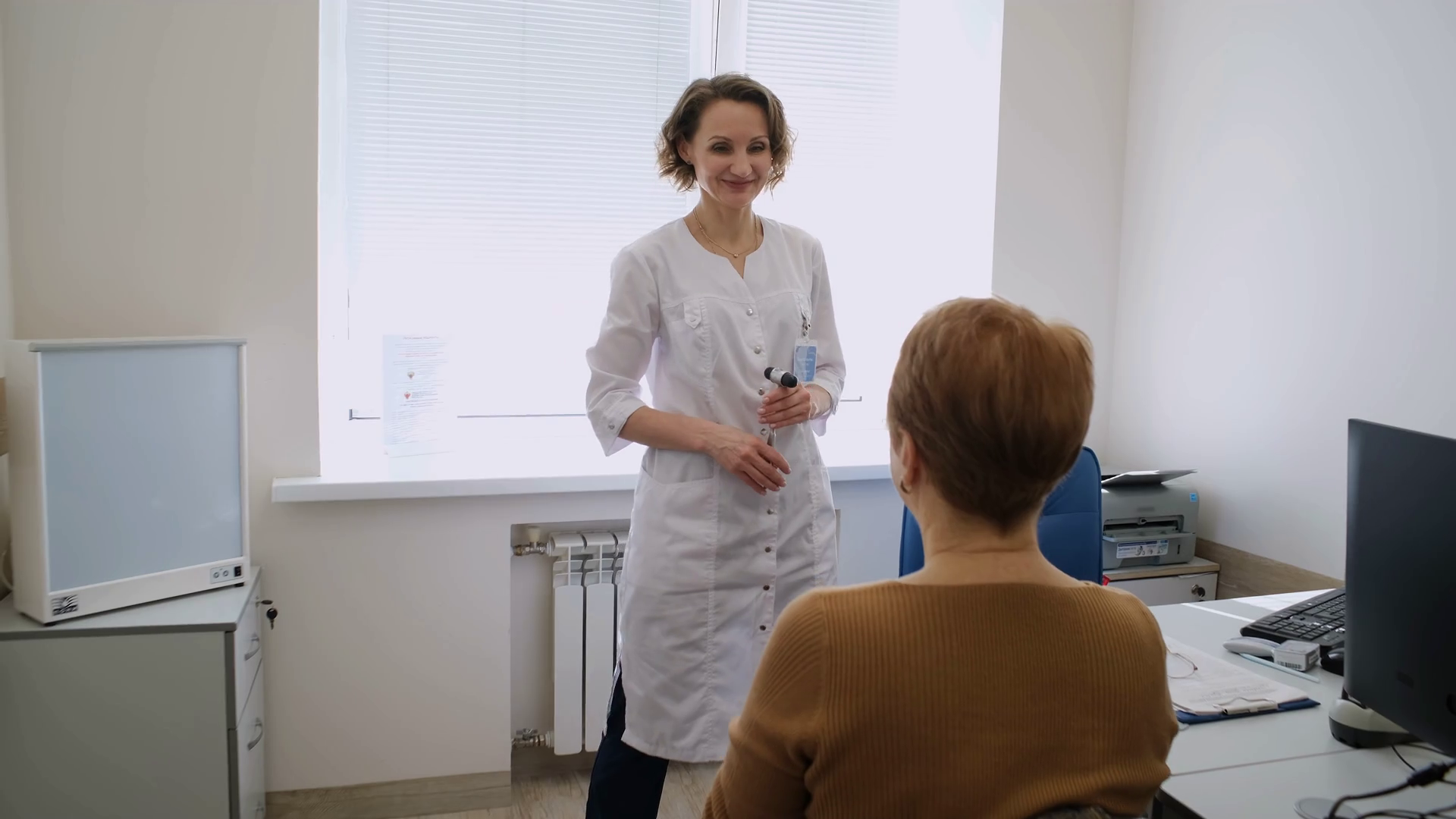 A Neurologist Examines Patient Using Hammer Stock Footage SBV348460076