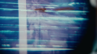 Viewing Street Scene On 35Mm Film Negative With Loupe, close up