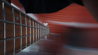 POV Close up of guitarist hand playing on guitar. Close up shot