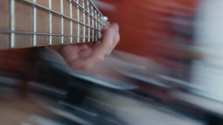 POV Close up of guitarist hand playing on guitar. Close up shot
