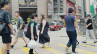 People crossing street in hong kong