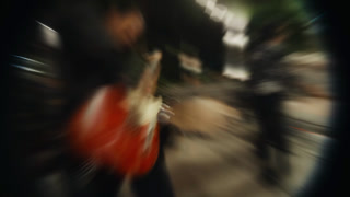 Rock band performing live music at an outdoor concert