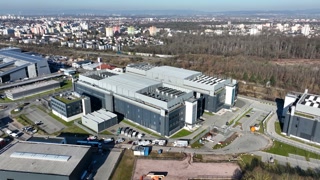 Data centers, computer centre, infrastructure for quantum computing, machine learning, AI, internet technology. Aerial drone footage