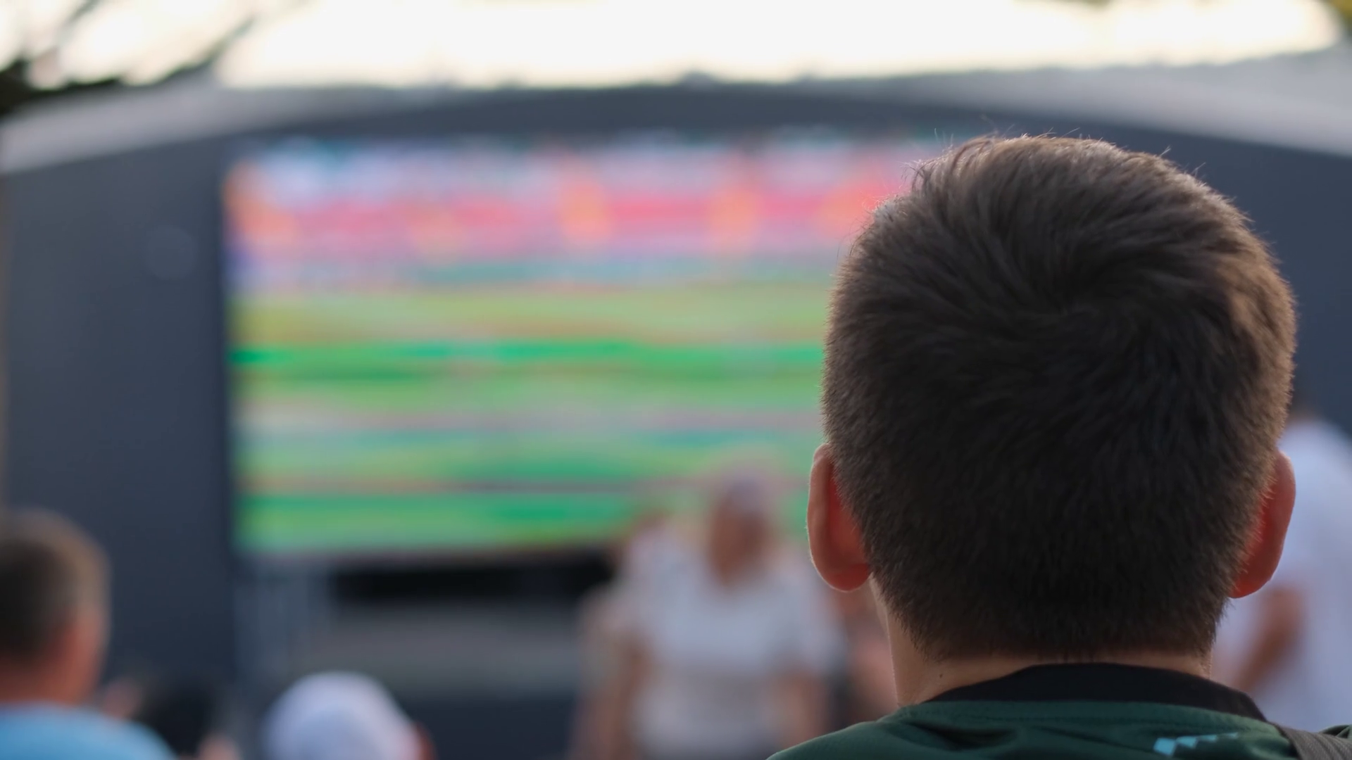 Little Boy Fan Watching Football Match In Stock Footage SBV347699152