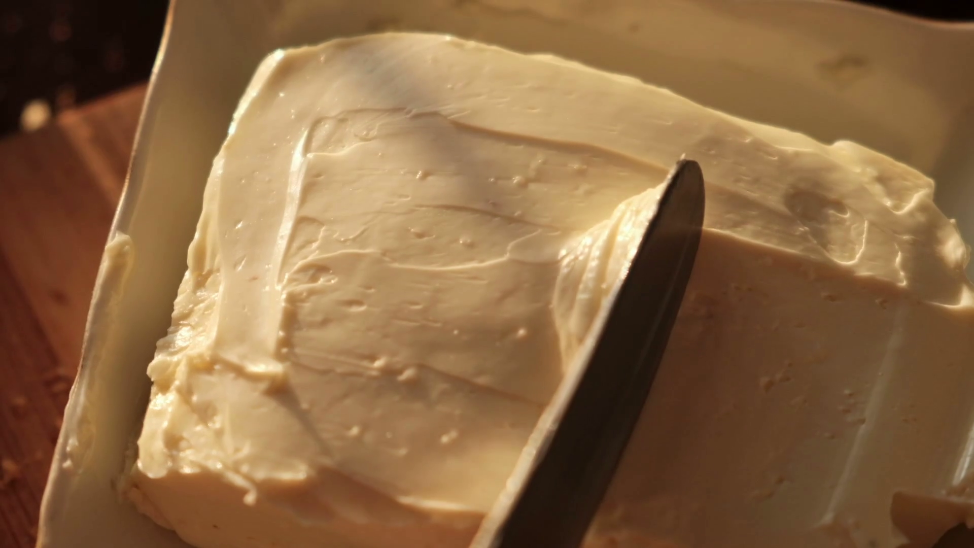 Cheese butter or margarine with knife Stock Video Footage 0009 SBV