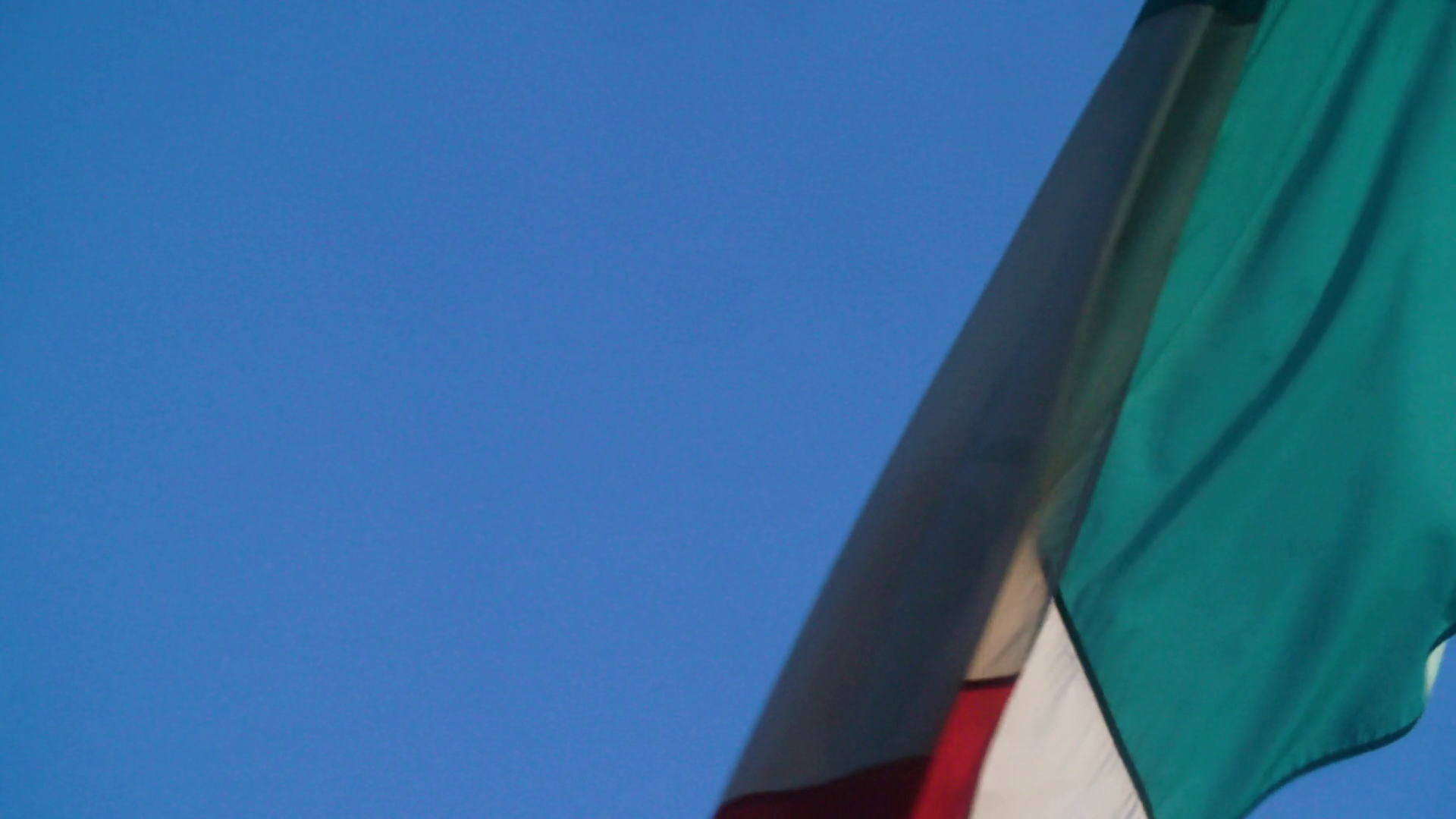 Slow Motion A Mexican Flag Unfurls In The Wind Stock Video Footage 00 