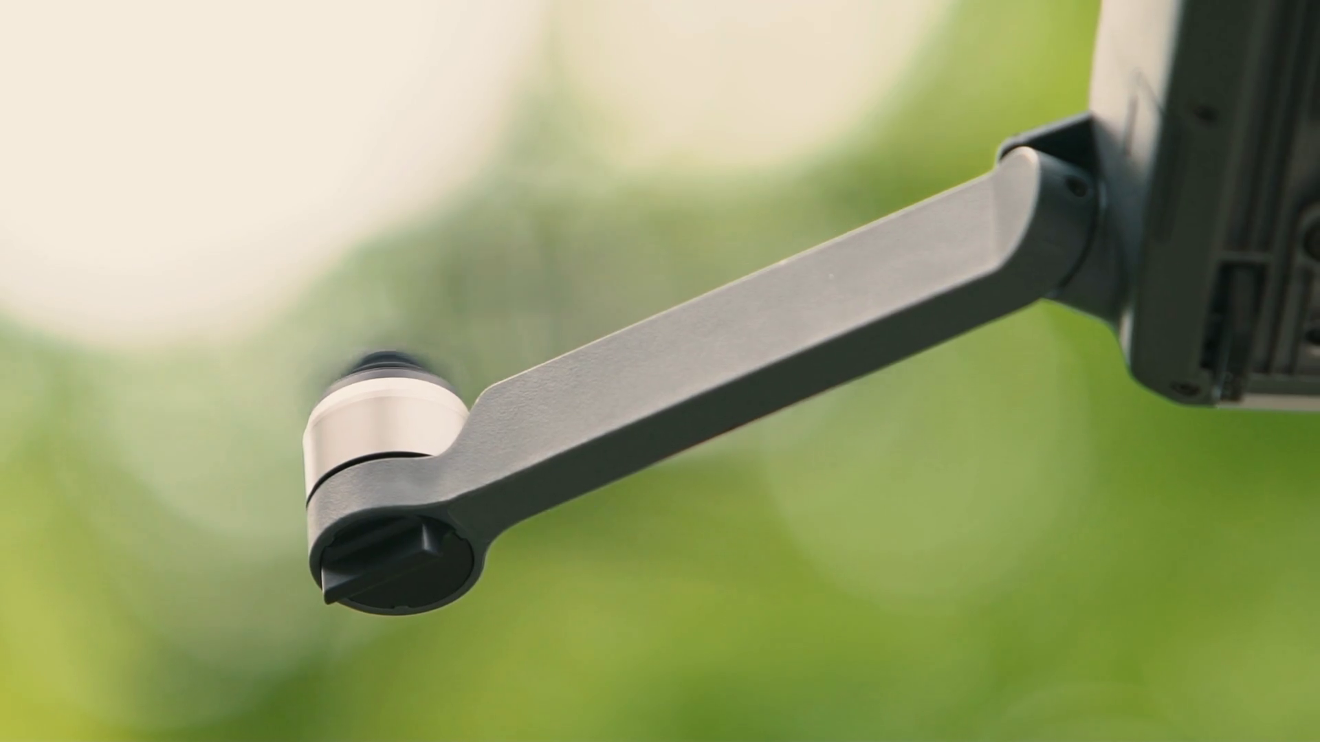 Slow motion Closeup of a Drone's Propeller/Rotor Arm in Flight Stock