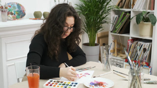 Crafting handmade picture with hearts for St. Valentine's Day
