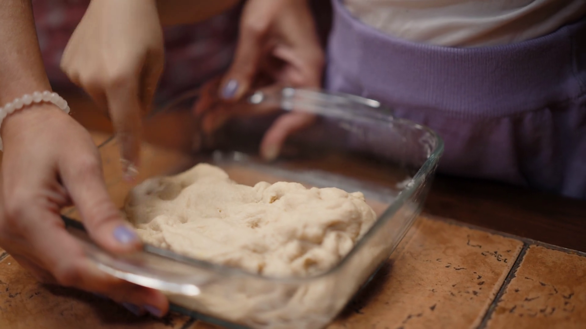 Young Indian Girl Kneading Dough Mother Stock Footage SBV347400805