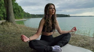 Engaging in Meditation by the Serene Lake Embracing Mindfulness in the Beauty of Nature