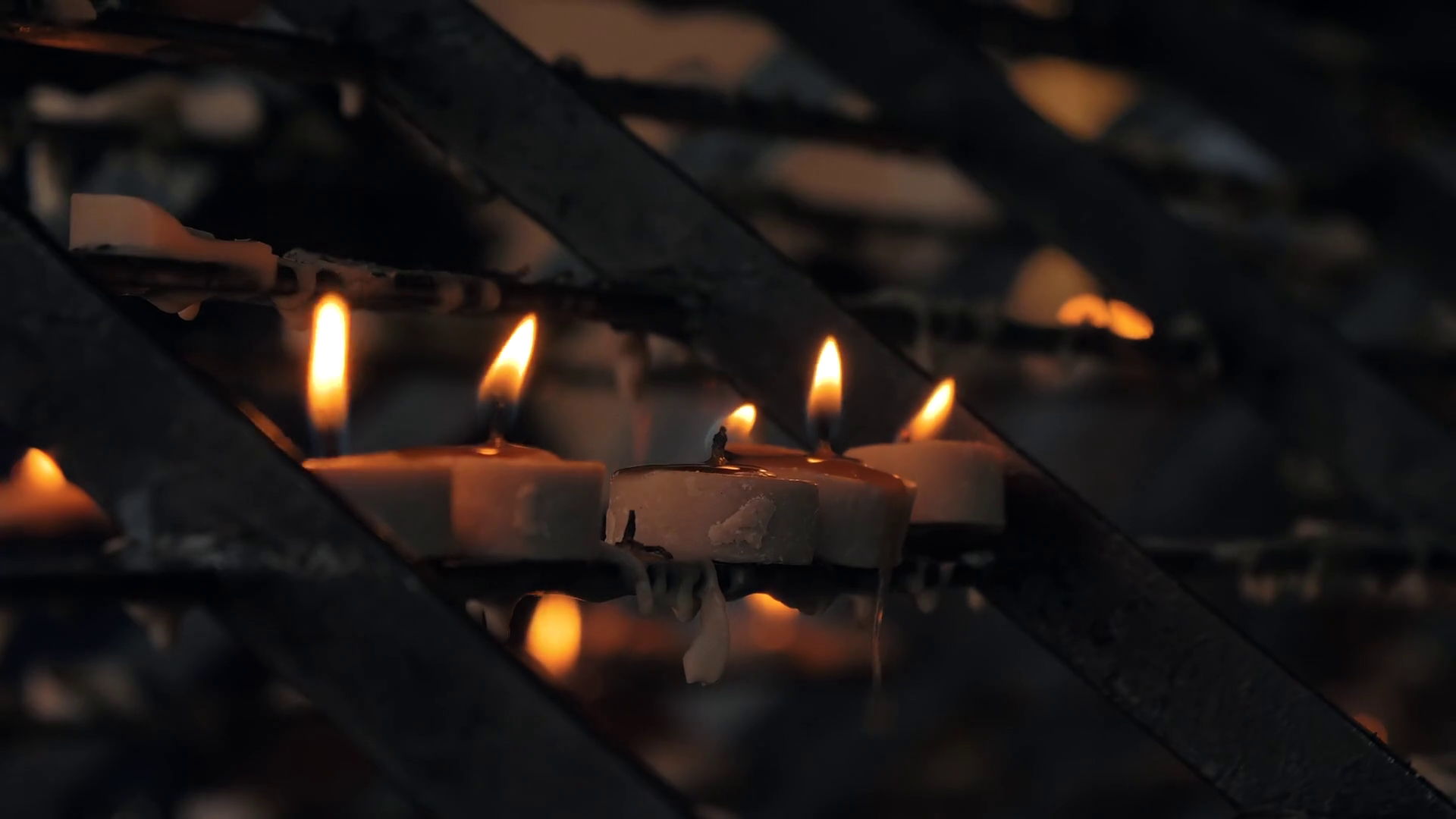 Closeup Shot Of Burning Candles In Catholic Stock Footage SBV