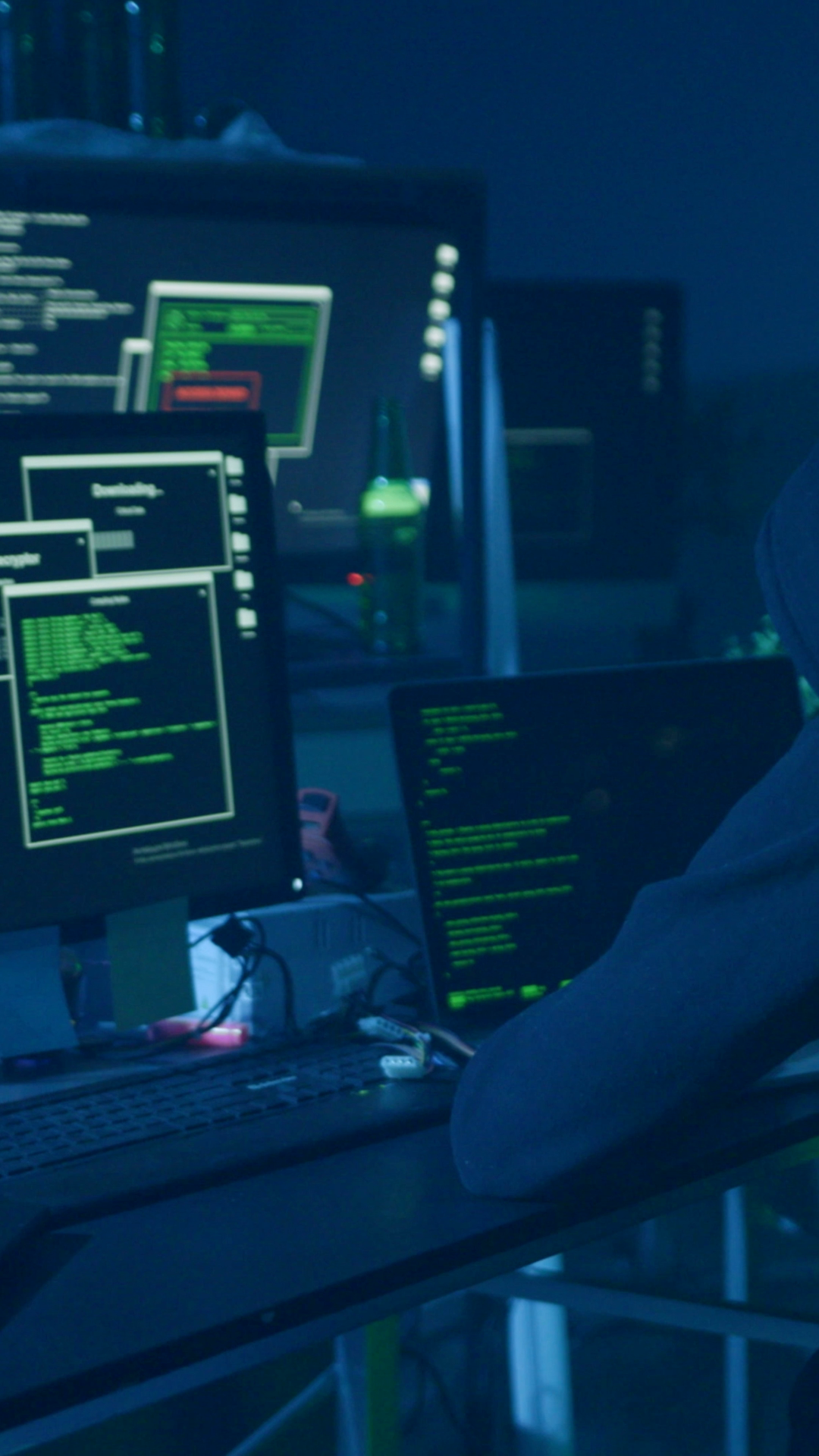 A Hooded Figure Types Intently On Computer Stock Footage SBV-353074087 ...