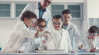 Children Engaging in Fun and Educational Science Experiments Inside the Setting