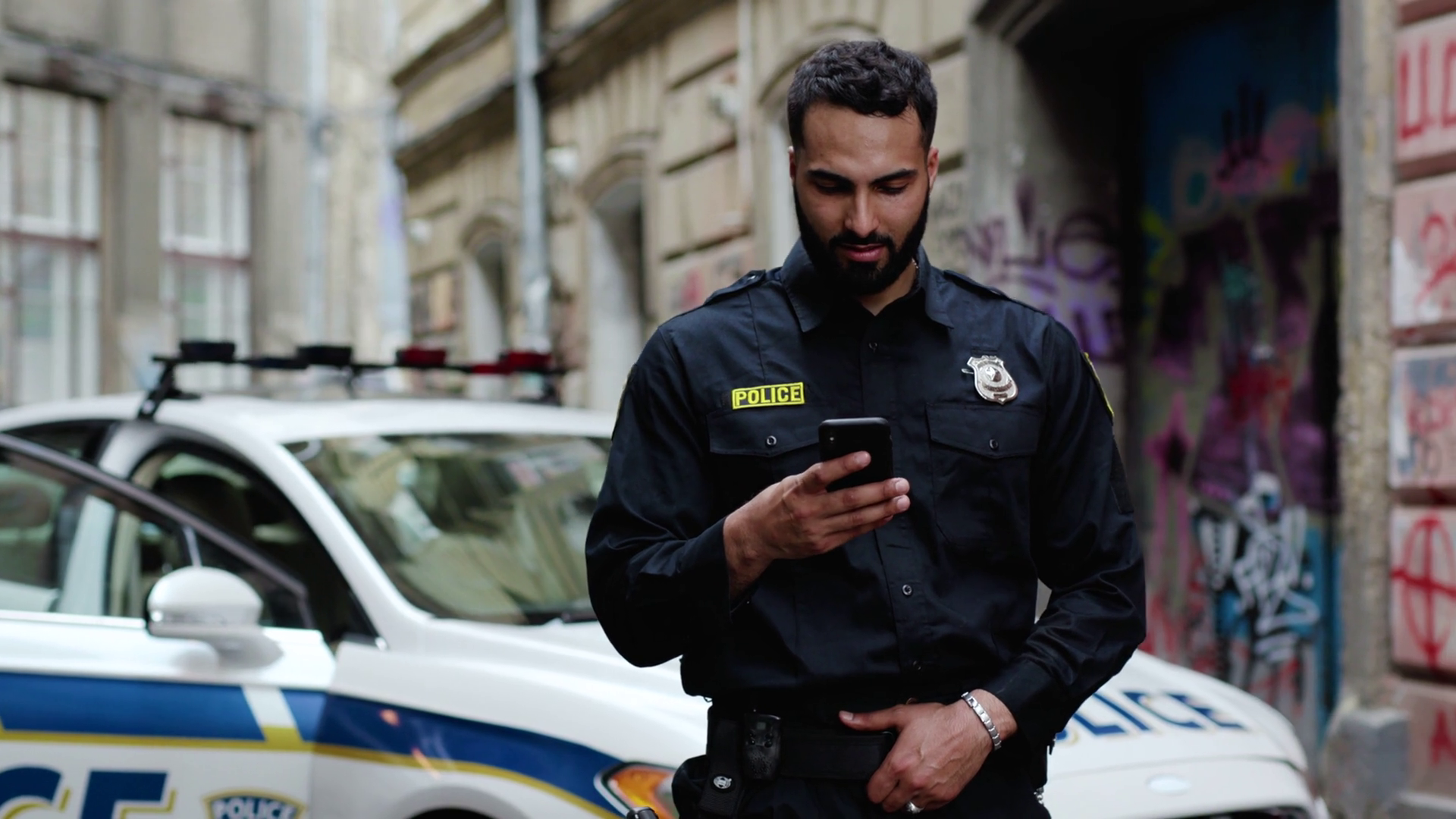 A Police Officer Uses Mobile Phone On Duty Stock Footage SBV-351966040 ...
