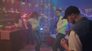 Vibrant loft hosts playful dance circle, Colorful loft scene with friends showing energetic dance moves