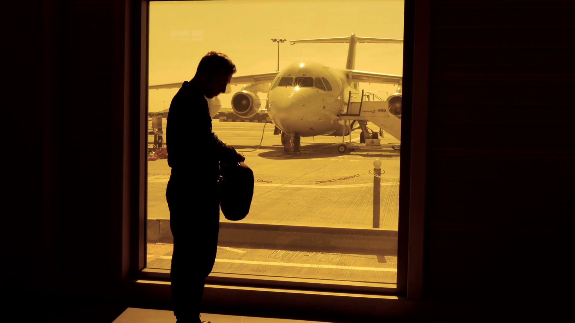 business passenger boarding at airport. jet plane standing at airport