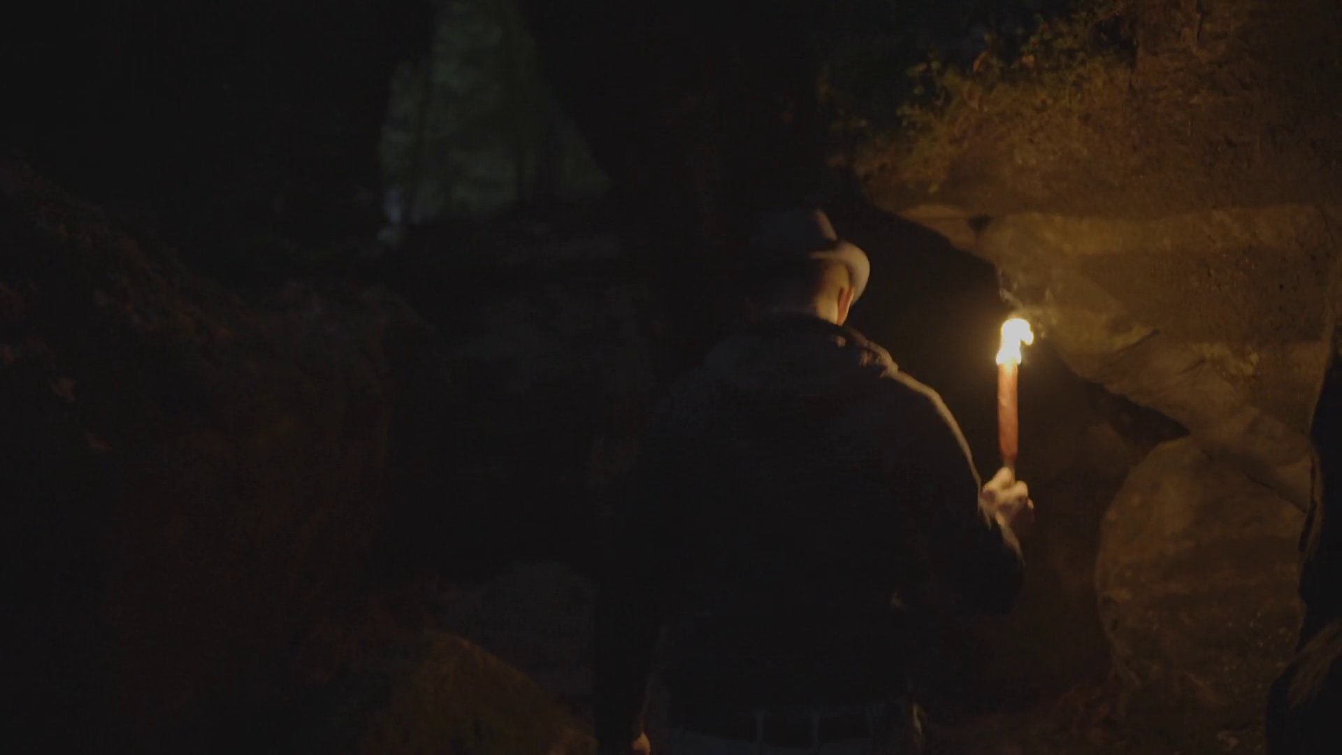 Man Holding Burning Torchlight Exploring Stock Footage SBV-348489732 ...