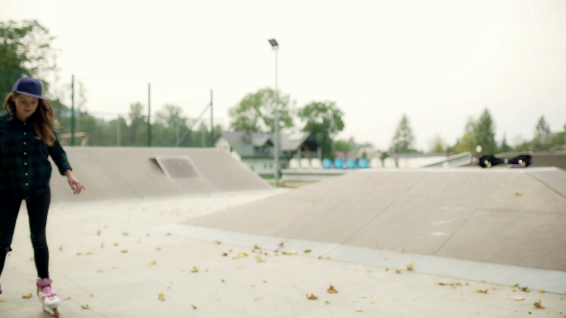 Girl Riding On Rollerblades In Skate Park Stock Footage SBV302729827