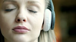 Girl Crying And Looks Very Sad While Listening Music Steadycam Shot Stock Video Footage Storyblocks