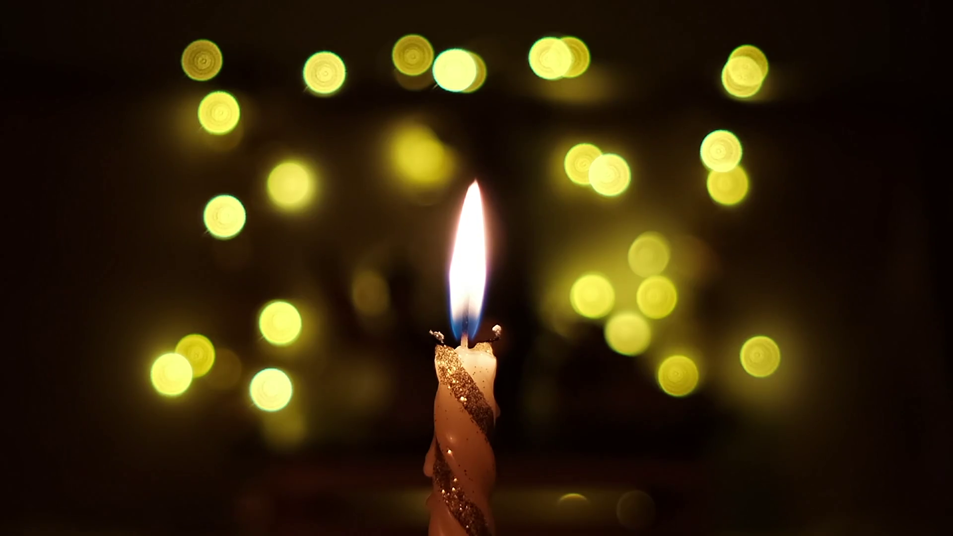 Candle and bokeh lights Christmas greeting card Stock Video Footage 00