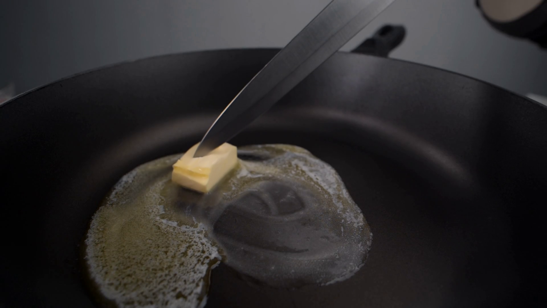 Chef Greases Hot Pan With Butter Melting Stock Footage SBV337938047