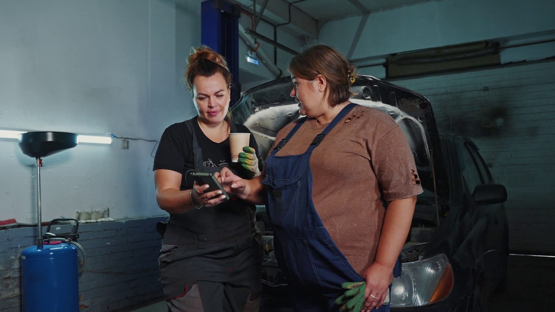 Women Mechanics Inspecting Car Engine Stock Footage SBV-351801749 ...