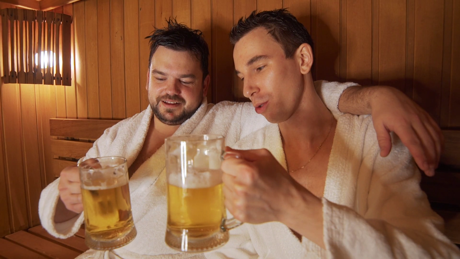Men Relax In Bath Sauna Drink Beer Stock Footage SBV329711107